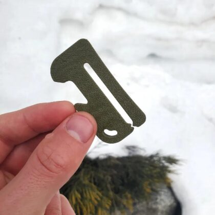 Clip-On Snowboard Goggle Scraper with Bottle Opener