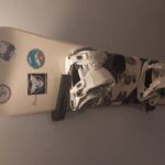 Snowboard wall holder