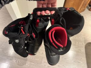 Snowboarding boots, gloves and helmet carrier