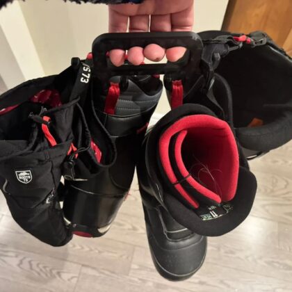 Snowboarding boots, gloves and helmet carrier