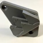 Wall-mounted snowboard rack